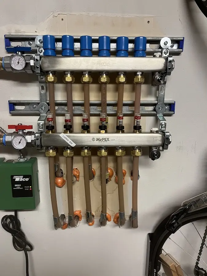 Plumber performing Water Heater Repair at a residential property in North Oaks